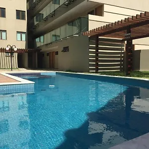 https://manawa-beach-flat-a-24.portodegalinhashotels.com